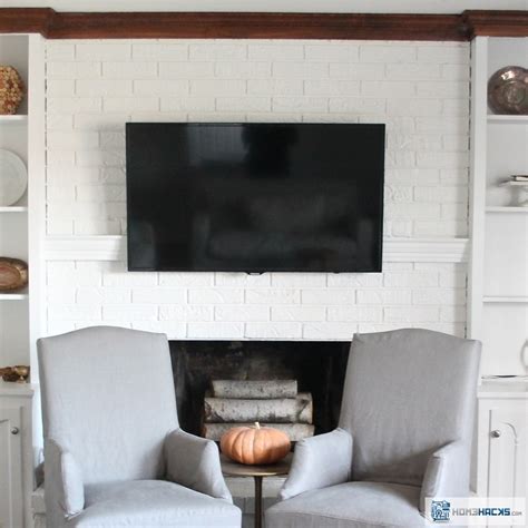 Is it possible to hide the wiring in the floor? How to Hide TV Wires Over a Fireplace - HomeHacks