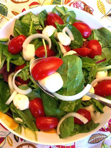 Easy tomato mozzarella salad with cherry tomatoes, fresh mozzarella, basil and red onions in a simple and delicious vinaigrette. Fresh Tomato Mozzarella Salad Recipe - Melanie Cooks