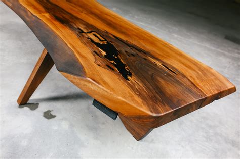 Traditional rectangular coffee tables are still popular but more and more people are turning towards the softer look of round coffee tables.with no sharp corners, they are a great choice. Nakashima Style Coffee Table - Nabla Furniture - Online Shop