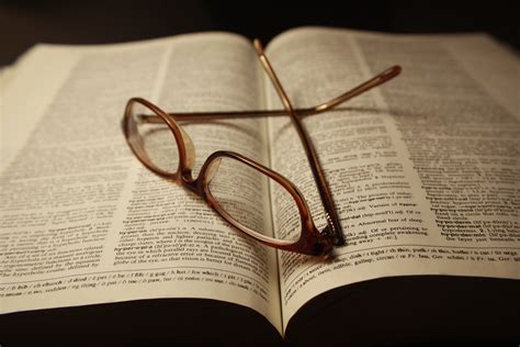 Reading Glasses atop Pages of Open Dictionary Book Picture | Free Photograph | Photos Public Domain