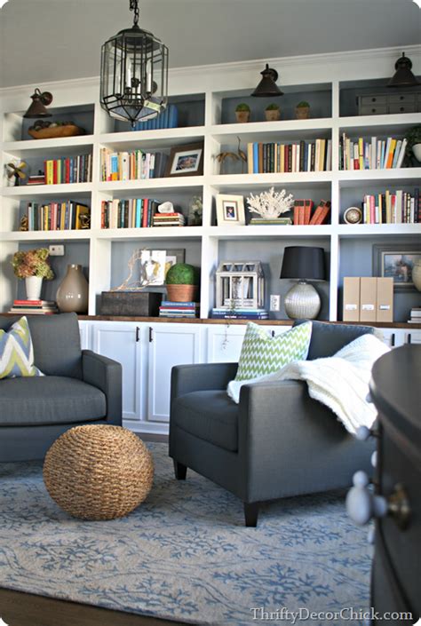 The times when the living room furniture covered an give the room an elegant industrial look with a set of bookshelves that look something like this. Dining room turned library, finally! from Thrifty Decor Chick
