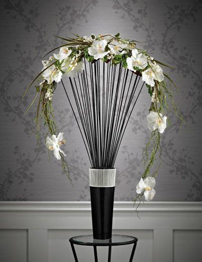 You can add color or stick with the black and white contrast. Floral arrangements, Entry tables and Design on Pinterest