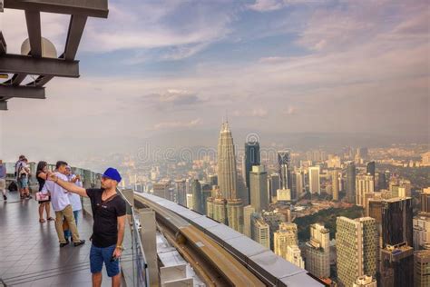 Visitors On Top Of The Menara Kl Tower With View Of The Kuala Lumpur