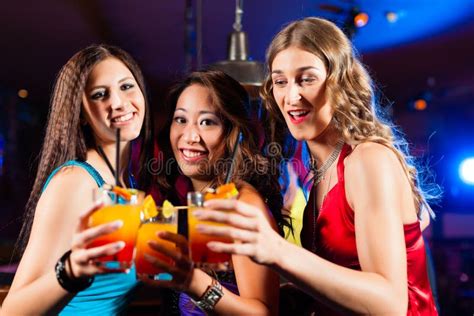 People Drinking Cocktails In Bar Or Club Royalty Free Stock Photo Image