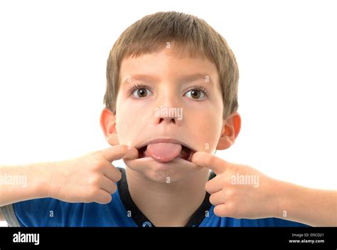 Face Sticking Tongue Out Cheerful Kid With Cat Muzzle Painting On