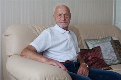 Smiling Old Man Sitting On Sofa Stock Photo Image Of Appartement