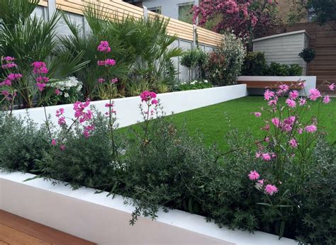 Potted plants are a quick and easy way to add splashes of colour. Modern garden design ideas Fulham Chelsea Battersea ...