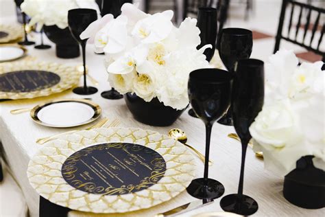 The table set gives you modern, efficient decor with a practical design made to last. Black, Gold and White Table Setting