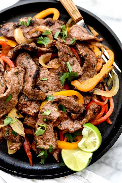 Marinate beef in soy sauce, lemon and pepper for at least one hour. The Best Steak Fajitas | foodiecrush.com