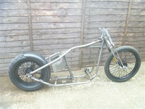 I road a rigid for a few years and did a number of 2000 plus mile road trips on it , difference is i built the bike with that in mind and had a cushy seat made most bobber guys won't like. harley custom bobber rigid frame rolling chassis