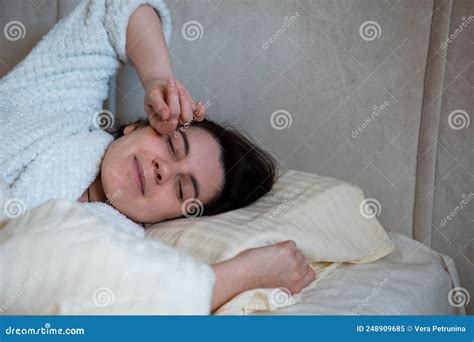 Morning In Bed Woman Awaking Laying Down In Bed With White Sheets Stock