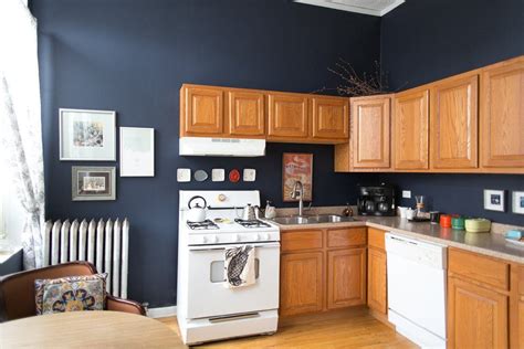 It can be considered a navy blue but with a bit more saturation to it. This Is How to Deal with Honey Oak Cabinets: Paint the ...
