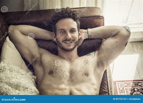 Shirtless Male Model Lying Alone On His Bed Stock Image Image Of