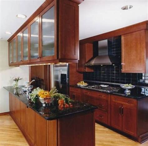 It has three clear glass shelves and additional one on bottom. Addition Storage Hanging Cabinets For Small Kitchen ...