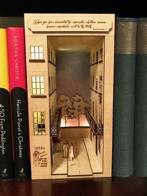These Creative Book Nooks Contain Miniature Fantasy Worlds
