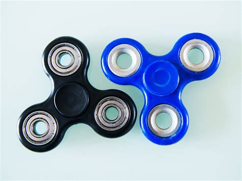 the physics of fidget spinners explaining the moment of inertia wired