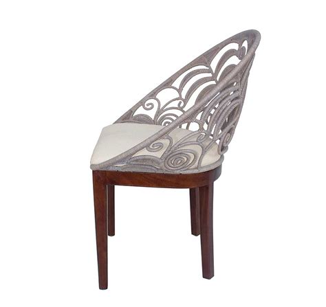 Crafted from metal, solid wood, and manufactured wood frame. Round Back Rattan Accent Chair NP 104 | Accent Seating
