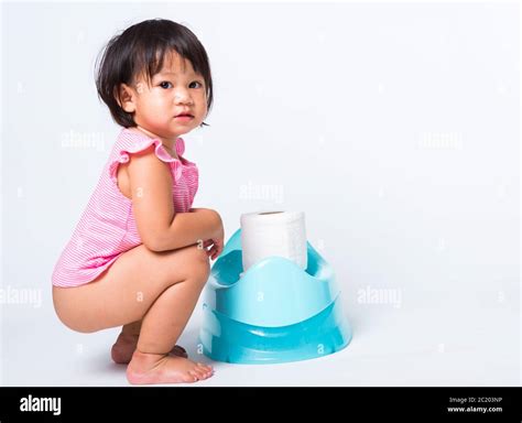 Asian Little Cute Baby Child Girl Education Training To Sitting On Blue