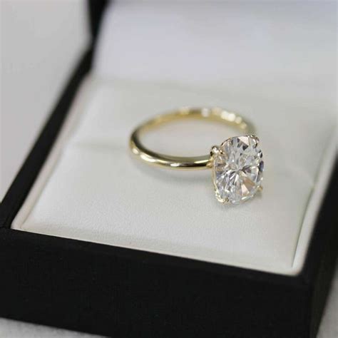 Explore a variety of white gold wedding rings at theknot.com. 4 Ct Oval Cut Diamond Solitaire Engagement & Wedding Ring ...