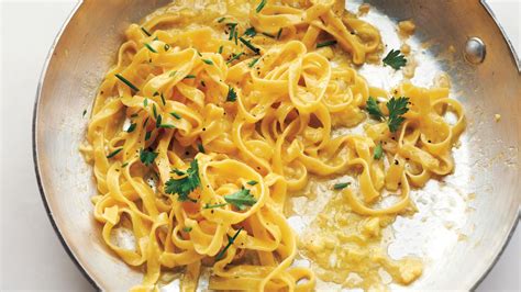 This tagliatelle dish coated in a buttery egg sauce and mixed herbs ...
