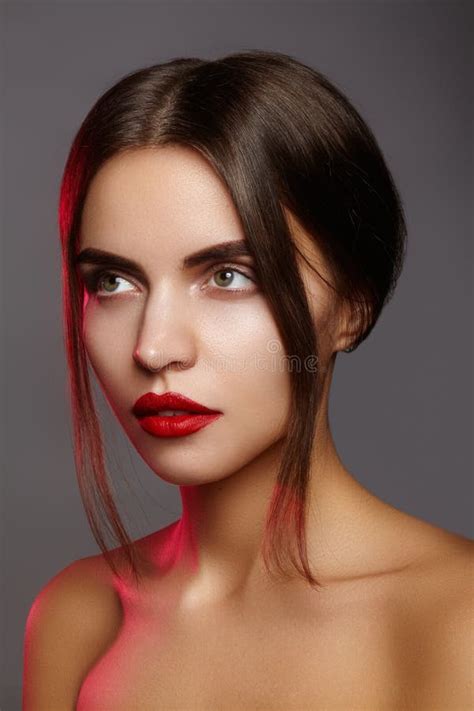 Beautiful Model With Fashion Make Up Close Up Portrait Woman With Glamour Lip Gloss Makeup And