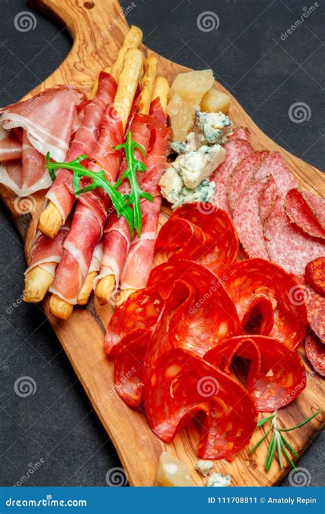Cold Smoked Meat Plate With Pork Chops Prosciutto Salami And Bread
