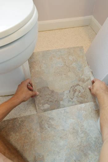 Take the time to lay bathroom tile exactly where you want it without adhering it to the floor just yet. Day Two Of Our Big Bathroom Makeover For Granny | Young ...