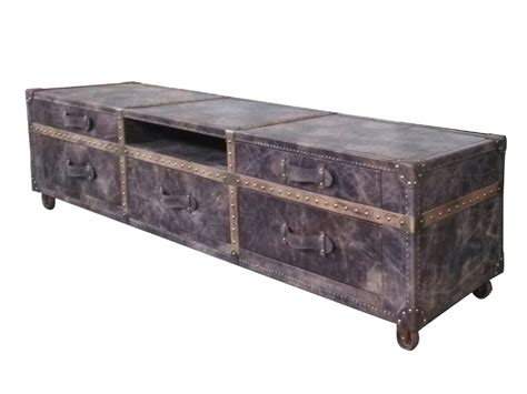 Concise lines and warm wooden tones will complement your living room. Wood Legs and Vintage Leather TV Stand