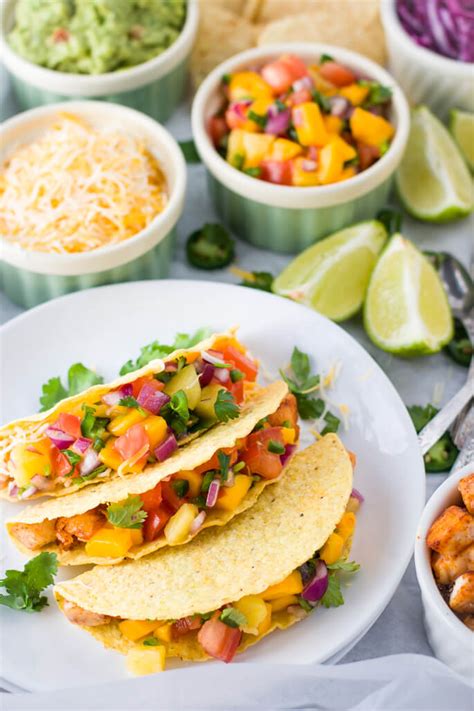 This colorful mango salsa recipe is so easy to make! Mahi-mahi fish tacos with pineapple mango salsa ~ The Pure Taste