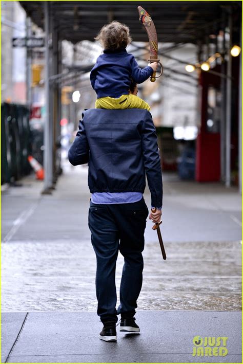 Orlando Bloom And Flynn Play With Toy Swords In The Big Apple Photo