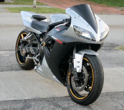 These are the best value for money, available for around $5k usd (for one with a few miles on it). 2003 Yamaha YZF R1 - GREAT DEAL