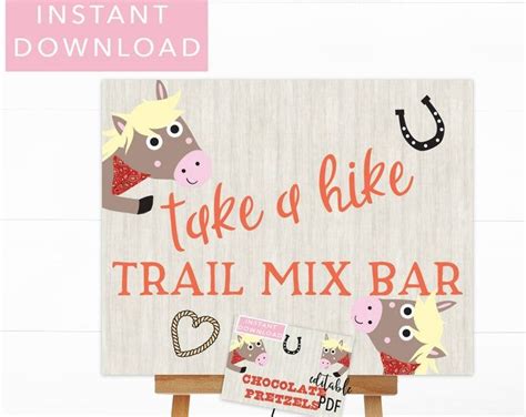 A Sign That Says Take A Hike Trail Mix Bar On Top Of An Easel