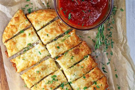 To begin, preheat the oven to 325 degrees fahrenheit and line a large baking sheet with parchment paper or a silicone baking mat. CHEESY GARLIC BREAD KETO RECIPES - Health and Food