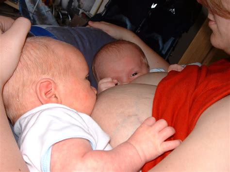 Tandem Feeding Twins Breastfeeding Twins And Triplets