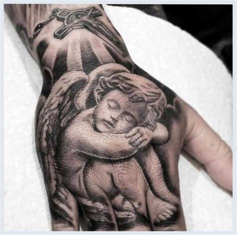 The popularity of angel tattoos is easy to explain. Angel Tattoo Styles, Ideas and Meanings | Tattoos Designs ...