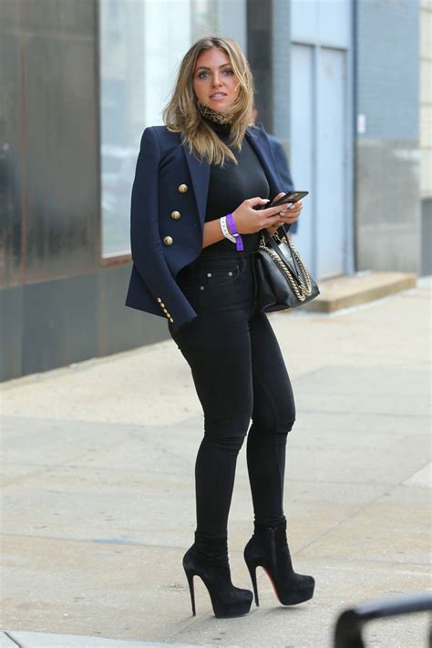 eleonora srugo in a sky high stiletto boots and tight jeans during new york fashion week