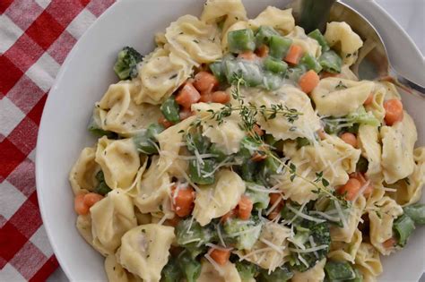 It's loaded with veggies and protein and coated in a deliciously simple and healthy southwest dressing. Tortellini Primavera with Veggies and Parmesan | Recipe in ...