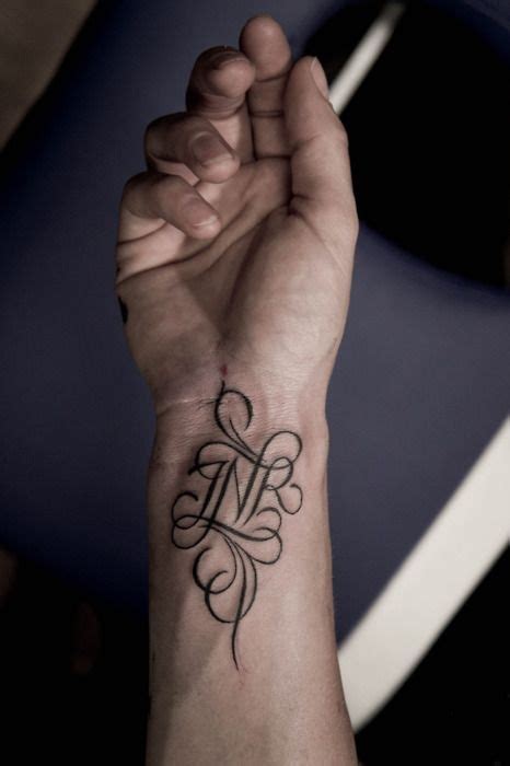 Small tattoos are often underappreciated by guys. 60 Charming Initial Tattoo Designs - Keep a Loved One Closer