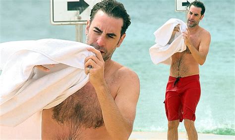 Sacha Baron Cohen Takes To The Surf At Sydney S Bondi Beach Daily