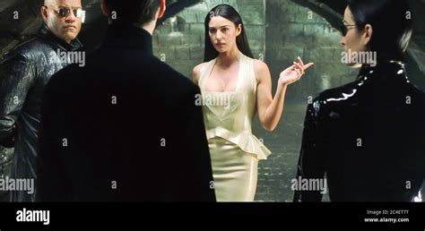 Usa Keanu Reeves And Monica Bellucci In A Scene From The ©warner Bros