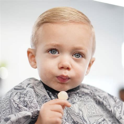Beautiful 2 year old little boy eating bre. Cute Haircuts For Toddler Boys: 14 Styles To Try In 2020