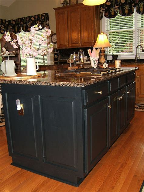 These days, many designers prefer darker neutral paint colors for kitchen islands. Painting An Oak Island Black | Hometalk