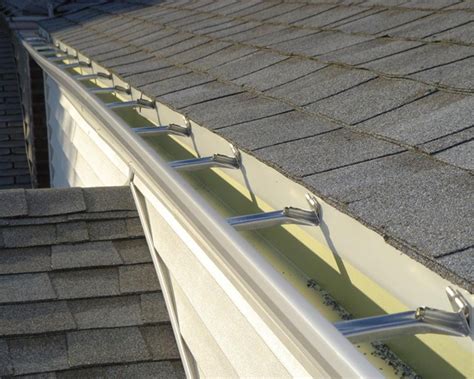 Seamless aluminium guttering specialists | bespoke guttering. Aluminum Gutters in Chicago - Nombach Roofing and Tuckpointing