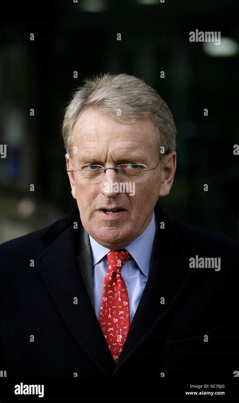 former british ambassador to the us sir christopher meyer leaves after giving evidence to the