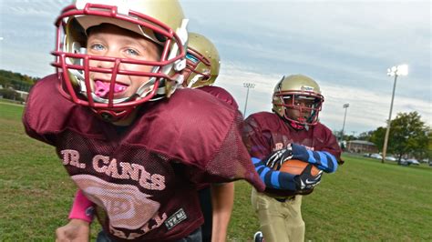 Youth football clinics try new angle to prevent ...