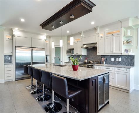 Contemporary white kitchen with shaker style maple cabinets, and quartz countertop. Contemporary kitchen island with shaker style cabinets ...