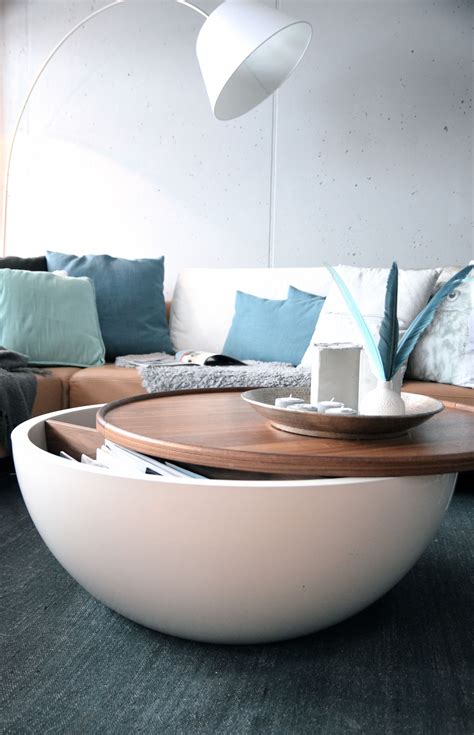 Same statue, same balcony, different day. Unique coffee table with amazing storage options for your ...