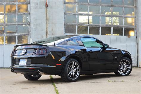 See the features in the 5l v8 ford mustang here. 2014 Ford Mustang GT - Autoblog