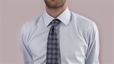 Either way, if you're looking for a knot that's nice and symmetrical but not quite as bulky, the half windsor is for you. How to Tie a Half-Windsor Knot - YouTube