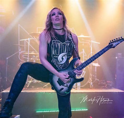 Choose the month in which the contribution will be made. Nita Strauss - Rock At Night